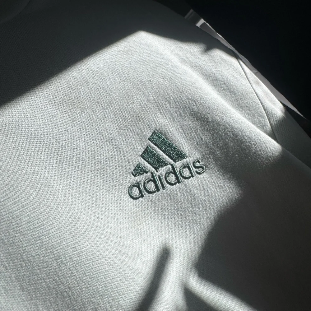 Adidas Essentials Fleece Sweatshirt in Linen Green